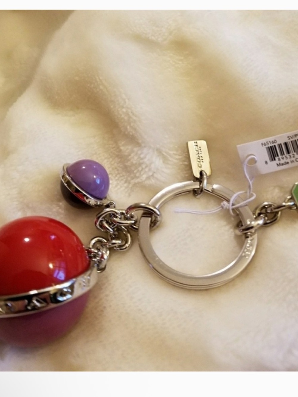 Coach NASA Orbit Keychain, also known as the Orb Mix Bag Charm NWT